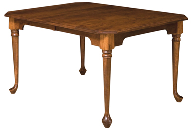 Carved legs and club feet add an elegant touch to this solid wood dining room table Amish Furniture Factory