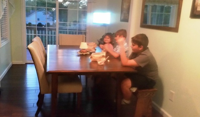 Christy Legged Dining Table from Amish Furniture Factory with kids having a snack