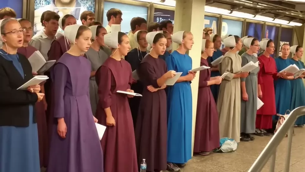 Amish entertainment Amish women and men choir singing in the church