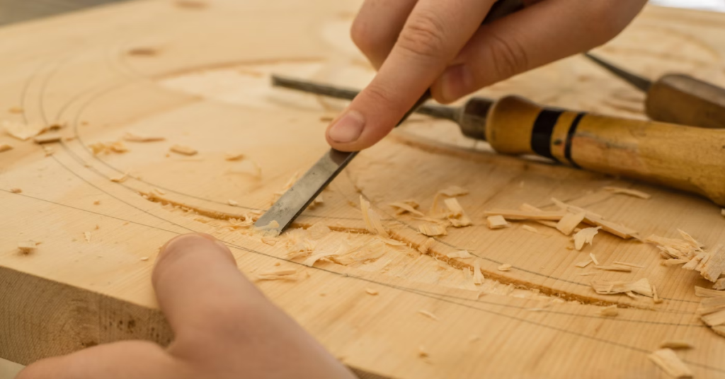 hand carving designs on a woodwork project