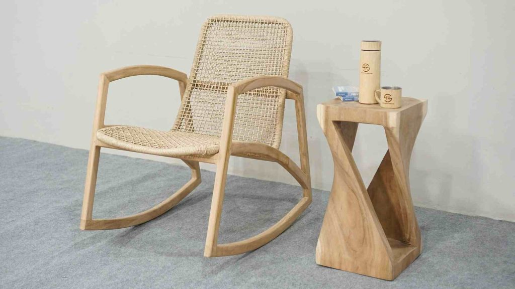 Light wood rocking chair and a small table